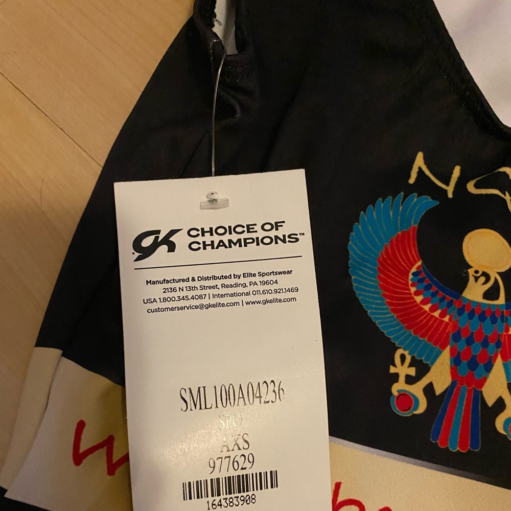 Size adult extra small. Good condition, new with tags, gymnastics leotard.